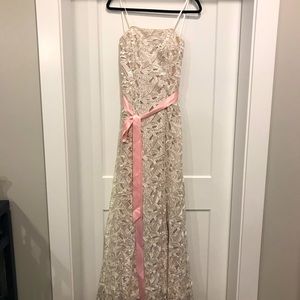 Beautiful full length cream evening gown.